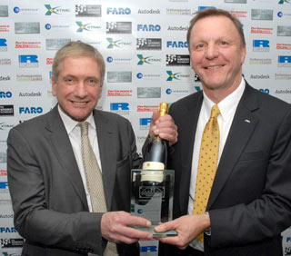 Ray Mallock acceots the MIA Teamwork Award 2010.